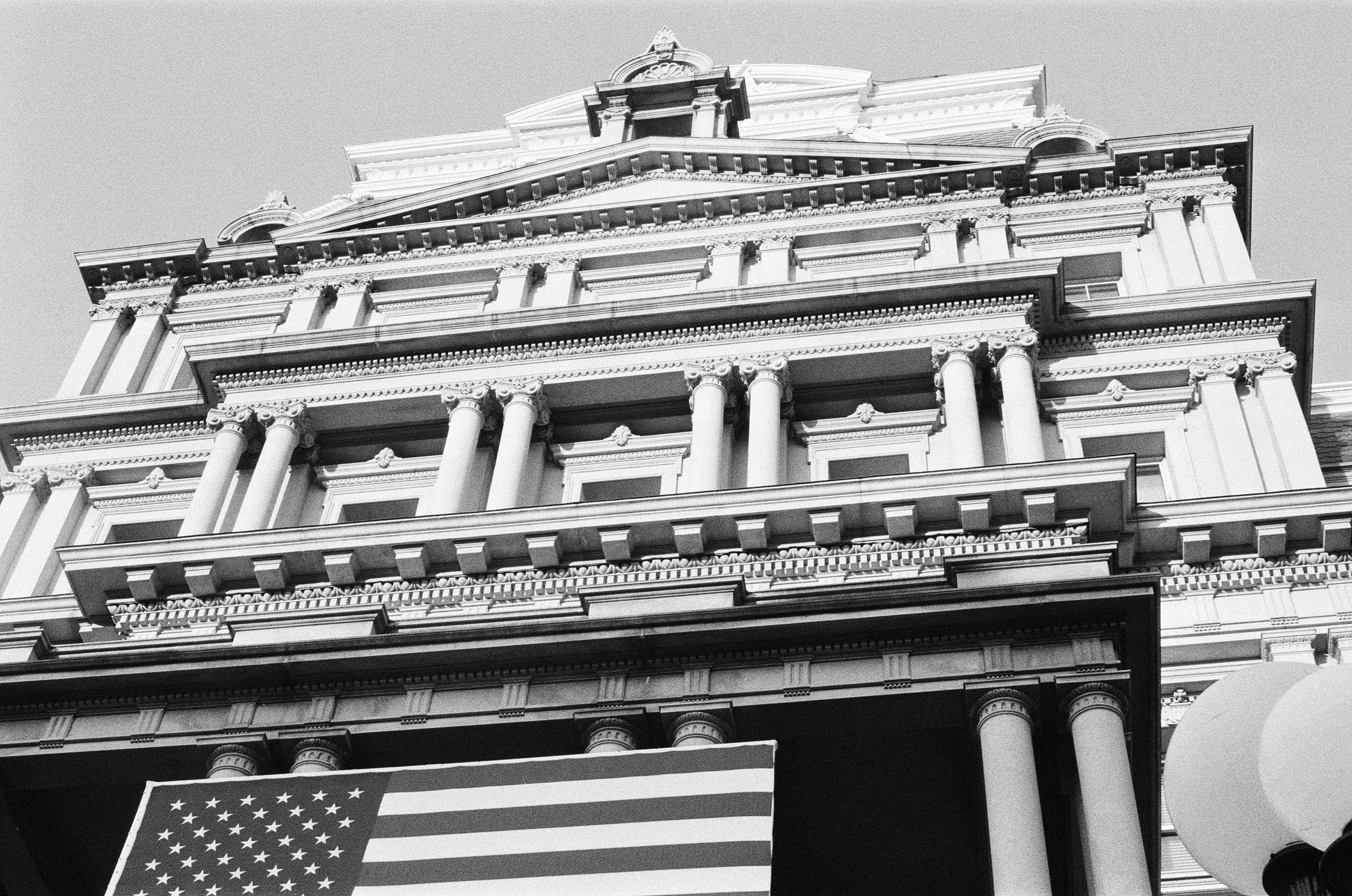 American flag draped at the Eisenhower Executive Office Building